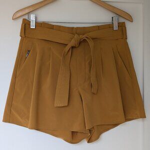 Athleta Women's Skyline Shorts II in Mustard/Yellow/Tuscan Gold Sz 8